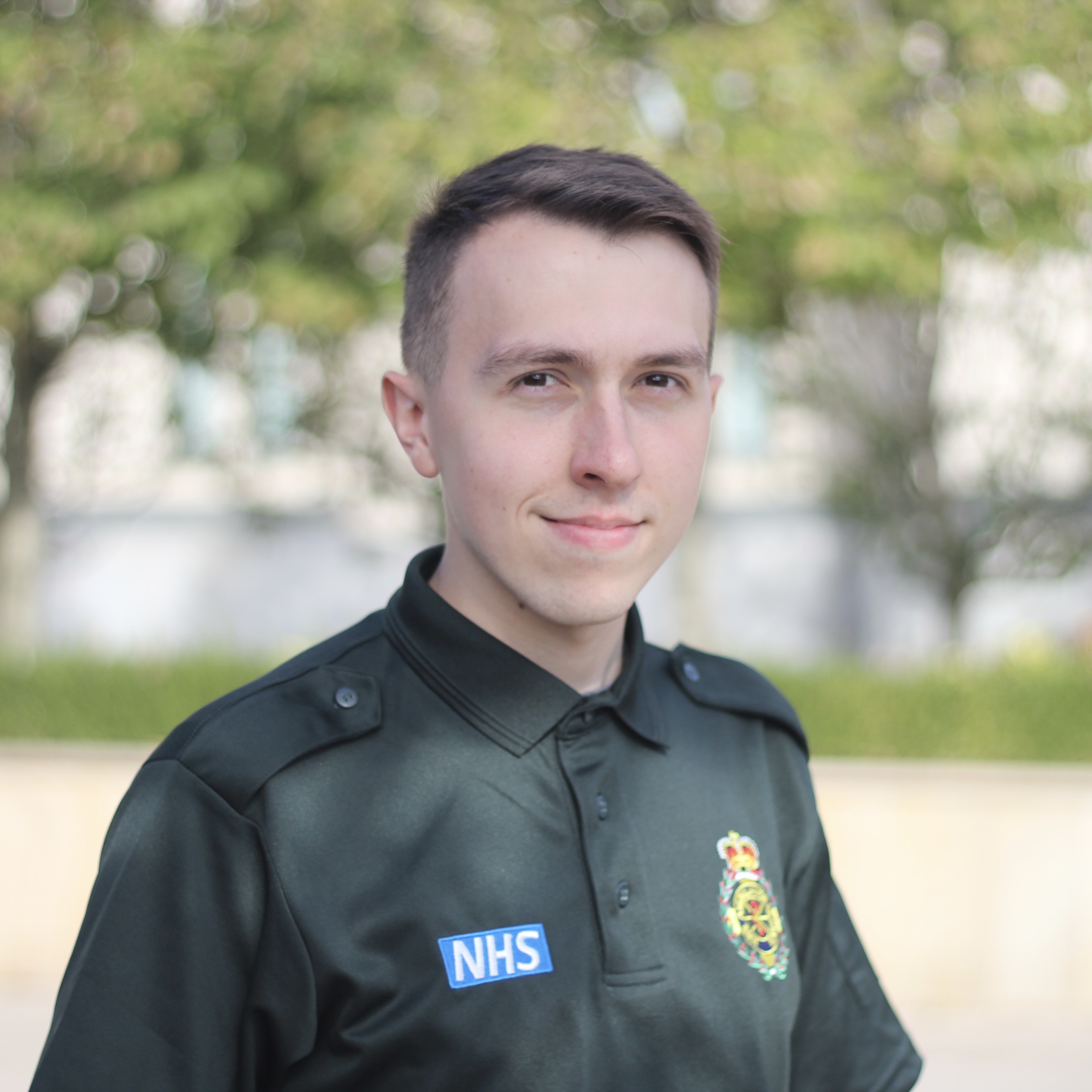 Headshot of Josh Reinke in ambulance service uniform