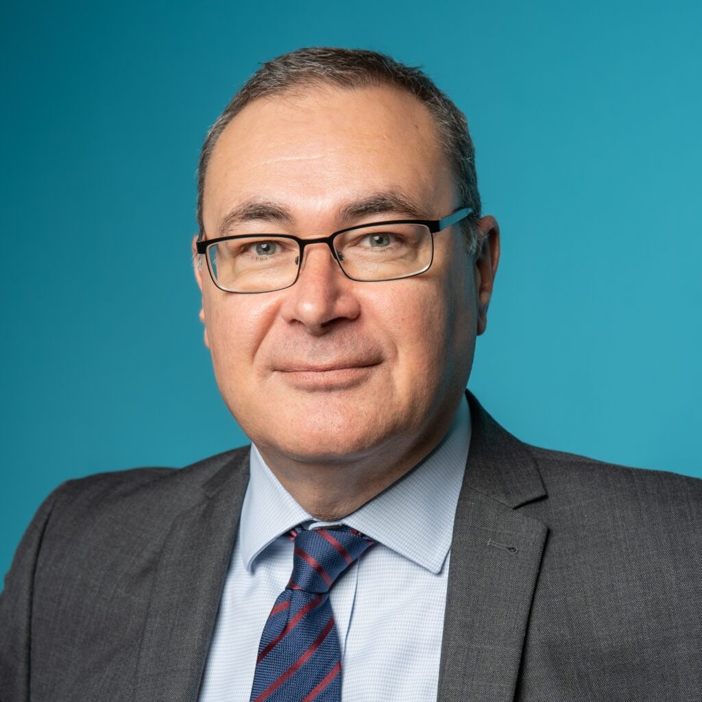 Headshot of Warren Heppolette