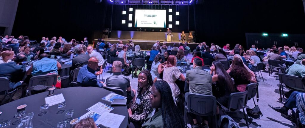 Wide shot of attendees at the Driving Race Equity Conference